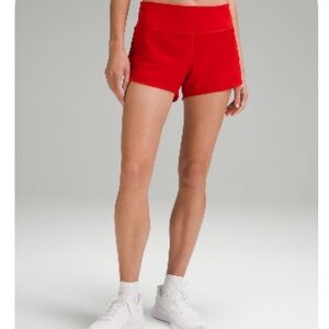Speed up mid rise lined 4 inch shorts
